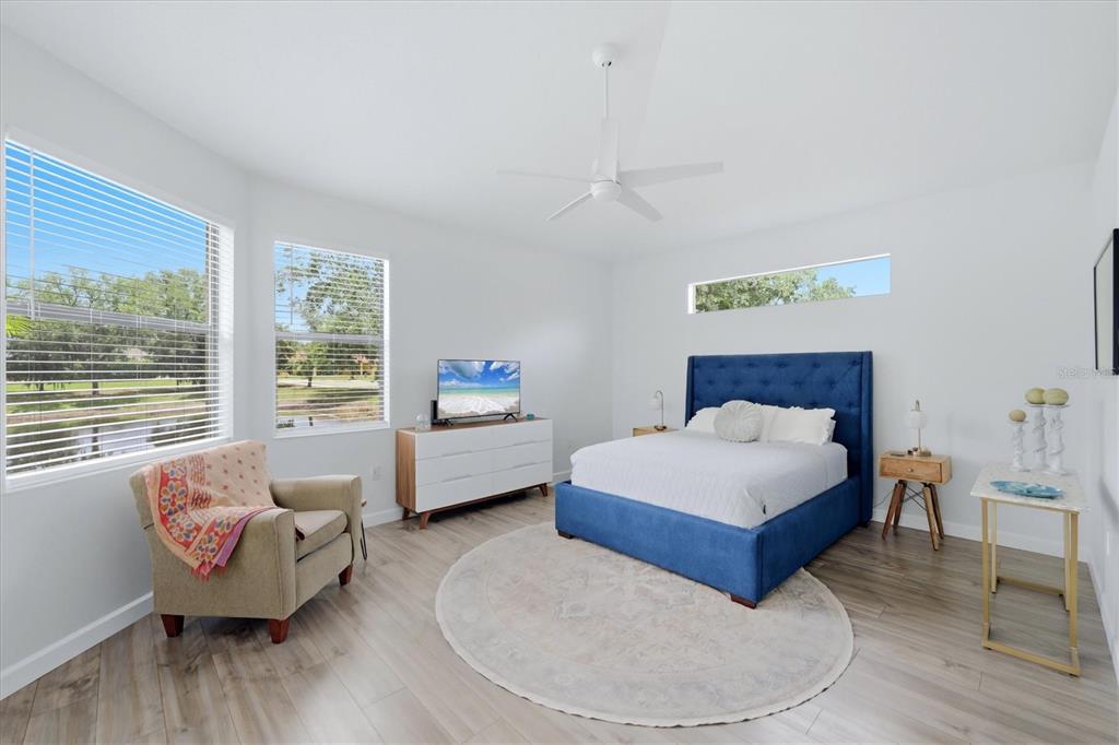 428 Snapdragon Loop Bradenton, FL 34212 - Photo 17 of 33 a bedroom with a bed couch and window