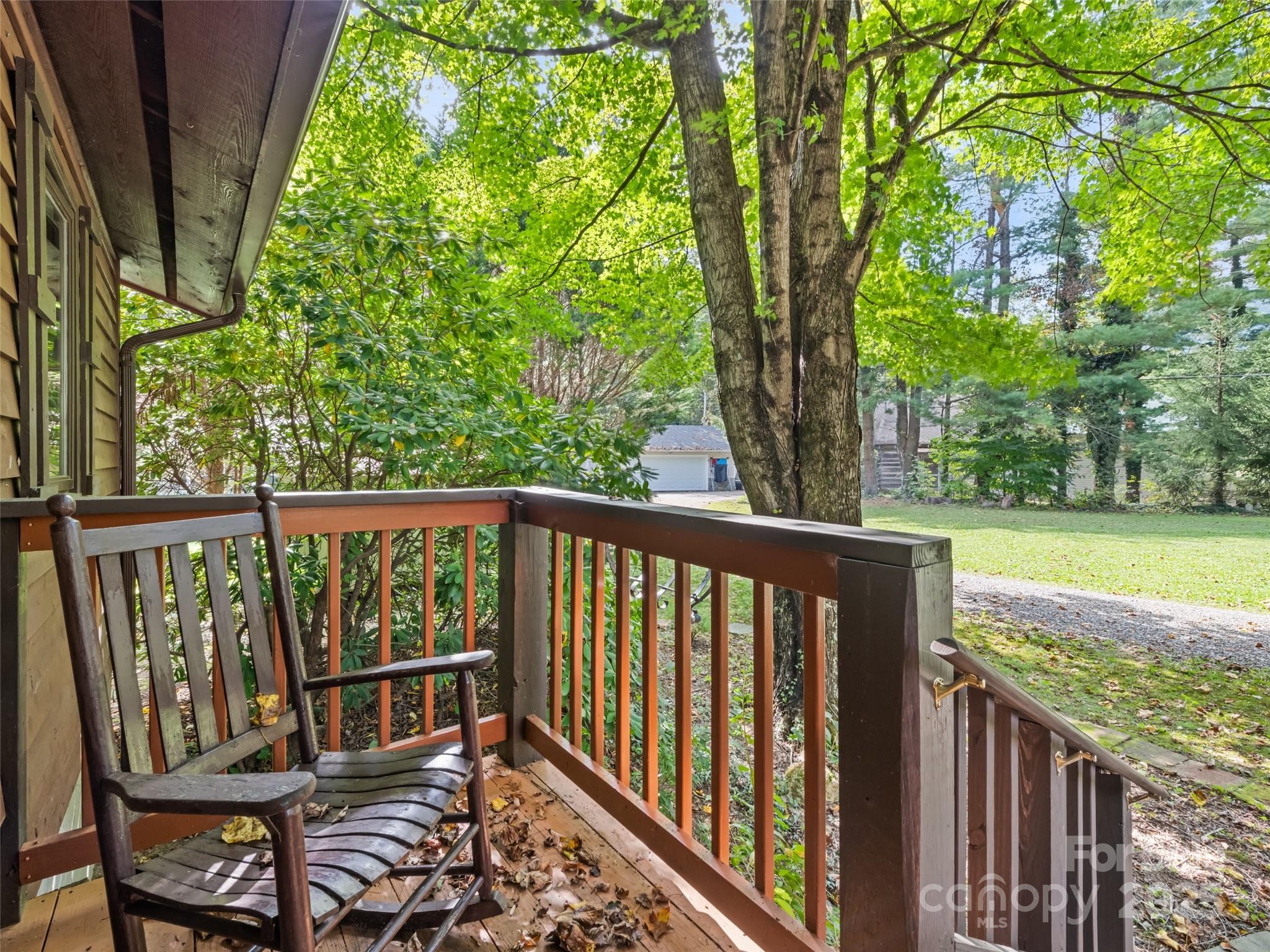 182 Laurel Branch Road Maggie Valley, NC 28751 - Photo 16 of 48 a view of a two chairs in the balcony