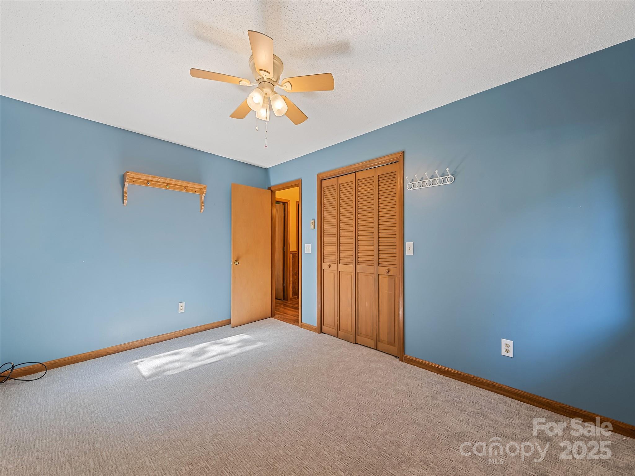 182 Laurel Branch Road Maggie Valley, NC 28751 - Photo 43 of 48 a view of an empty room with a window