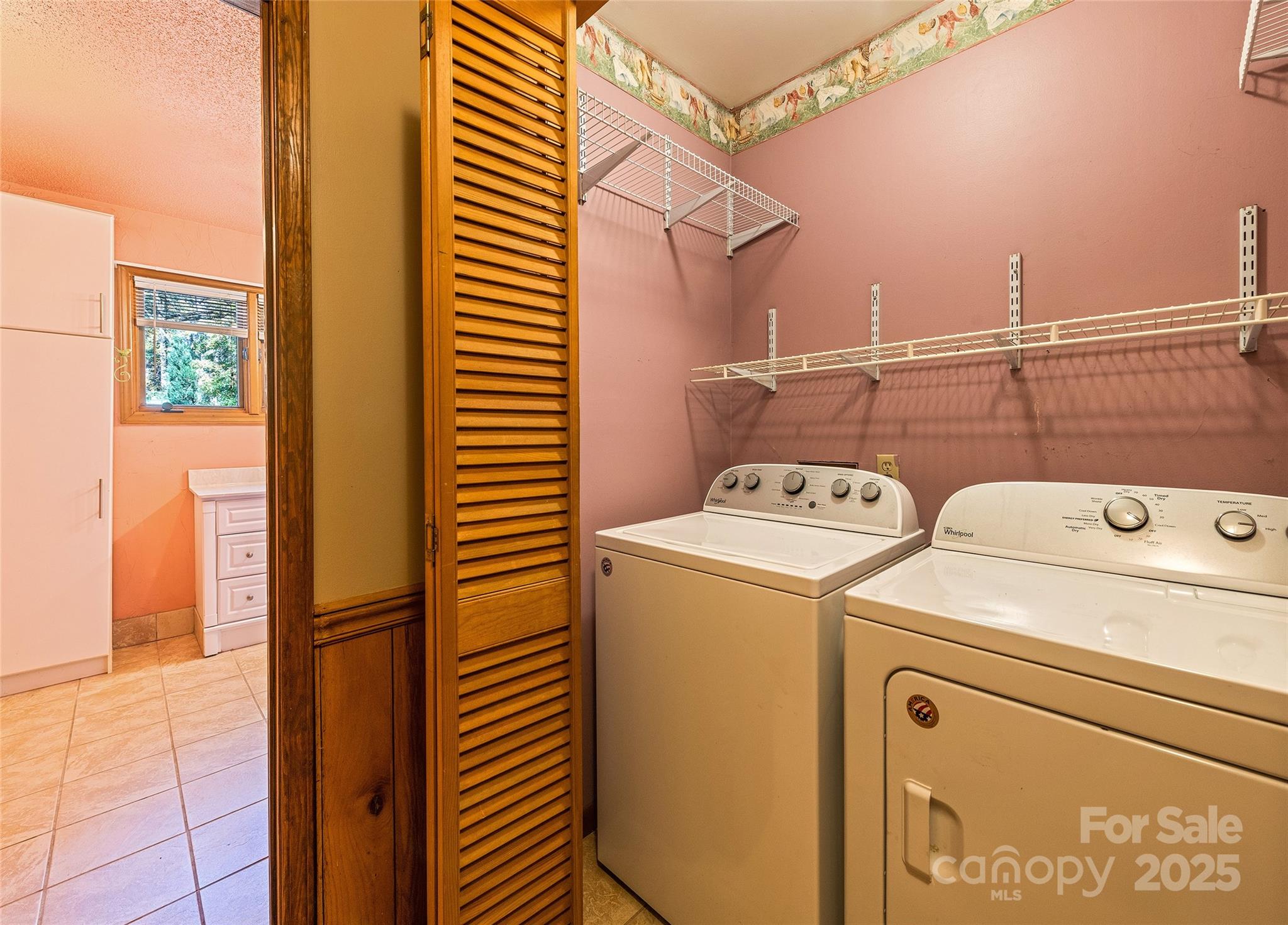 182 Laurel Branch Road Maggie Valley, NC 28751 - Photo 46 of 48 a utility room with dryer and washer