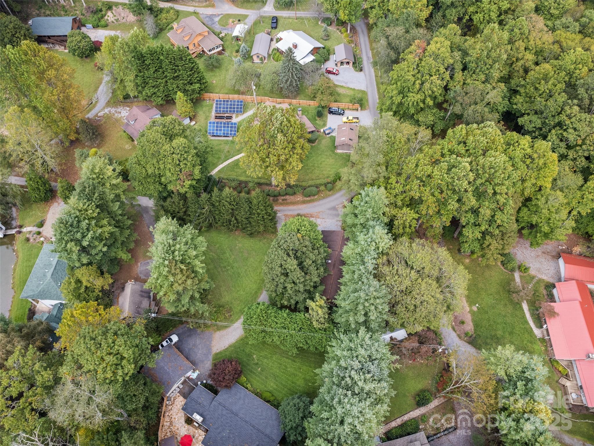 182 Laurel Branch Road Maggie Valley, NC 28751 - Photo 8 of 48 an aerial view of a house with a yard