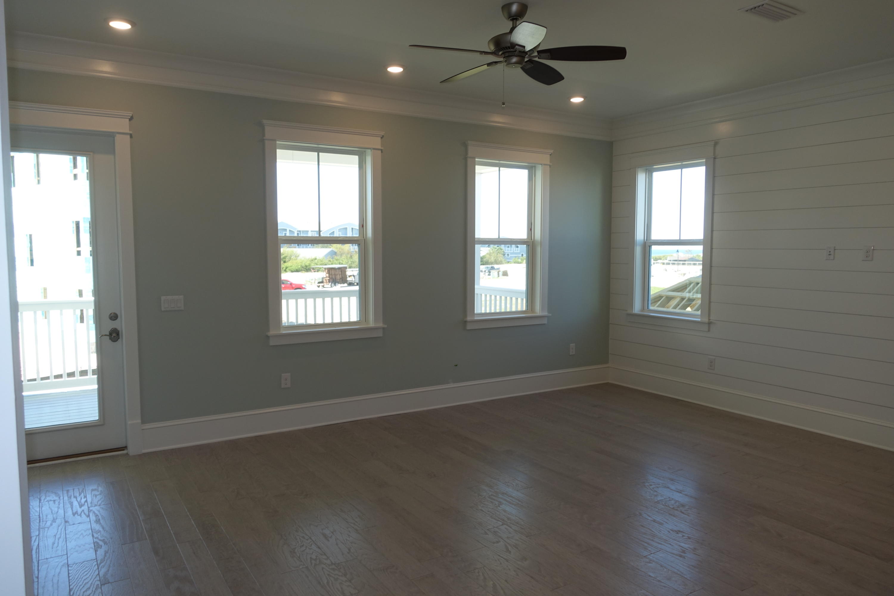 161 Siasconset Ln Inlet Beach Inlet Beach, FL 32461 - Photo 17 of 55 a view of an empty room with wooden floor and a window