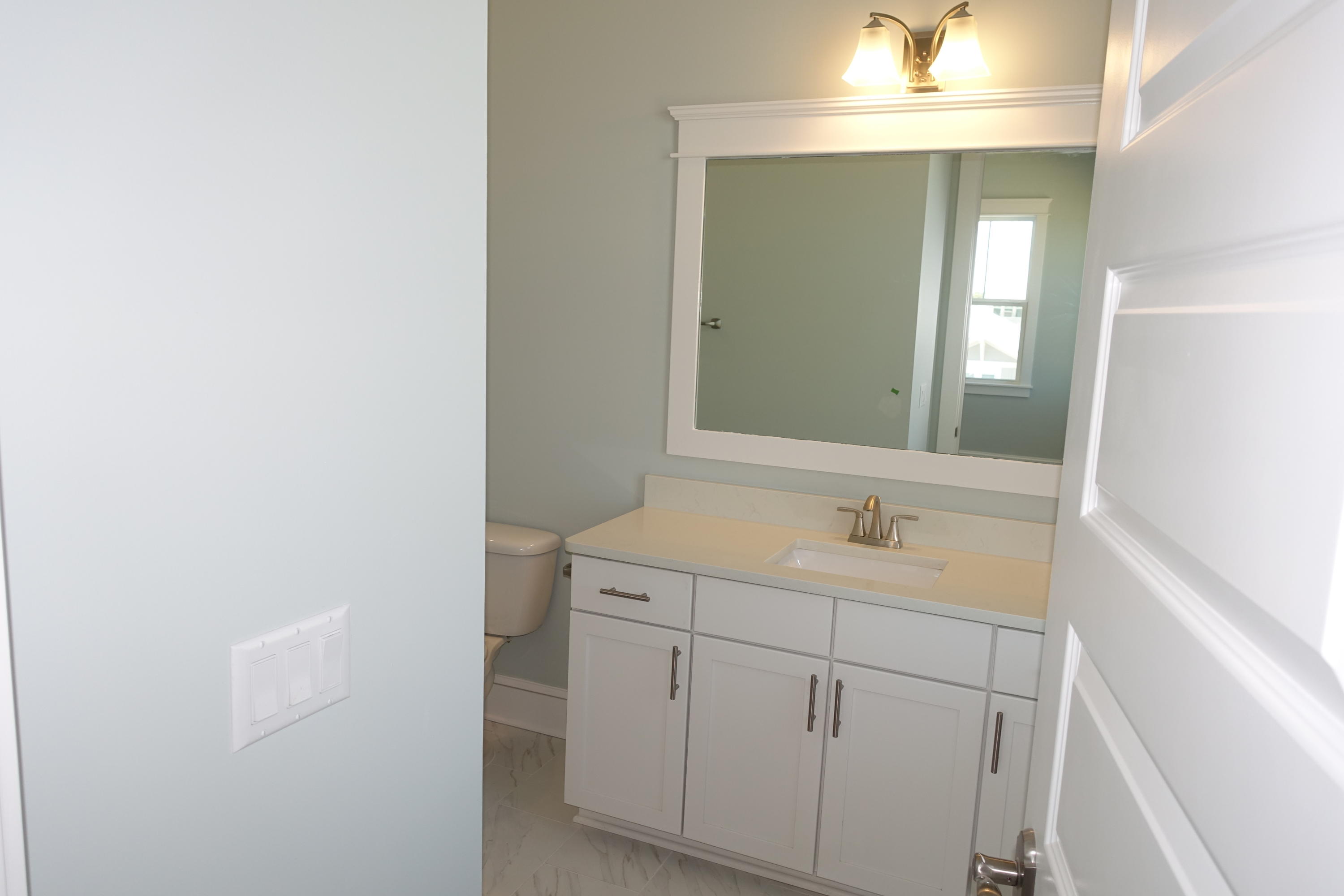 161 Siasconset Ln Inlet Beach Inlet Beach, FL 32461 - Photo 48 of 55 a bathroom with a sink and a mirror