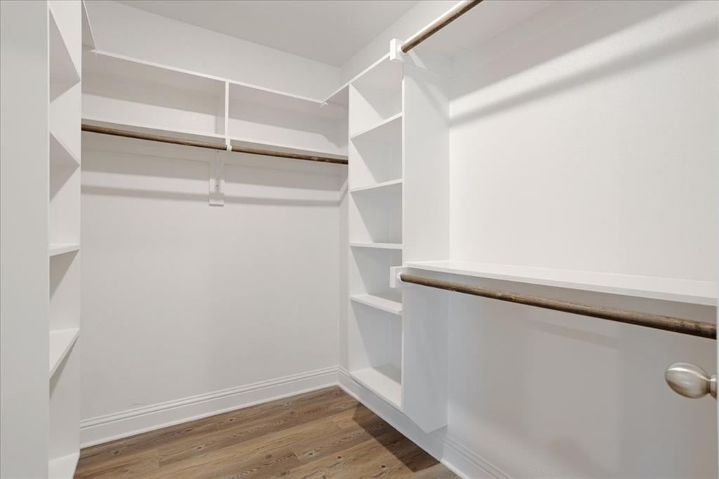 2111 Wyldewood Way Sherman, TX 75092 - Photo 25 of 33 a view of an empty walk in closet