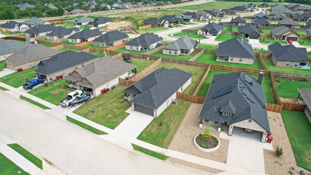 2111 Wyldewood Way Sherman, TX 75092 - Photo 30 of 33 an aerial view of a house with a yard