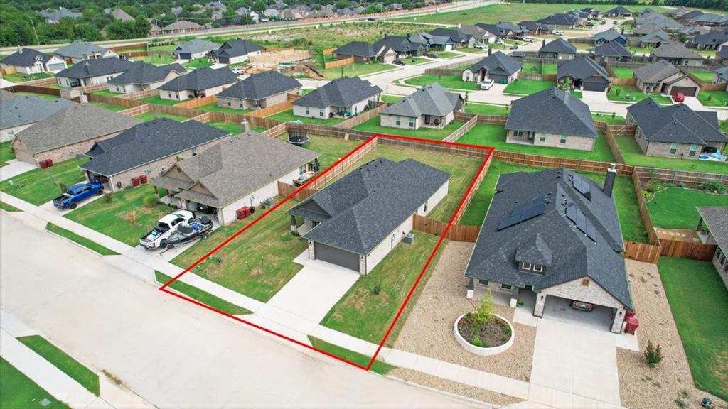 2111 Wyldewood Way Sherman, TX 75092 - Photo 31 of 33 an aerial view of a house with a ocean view