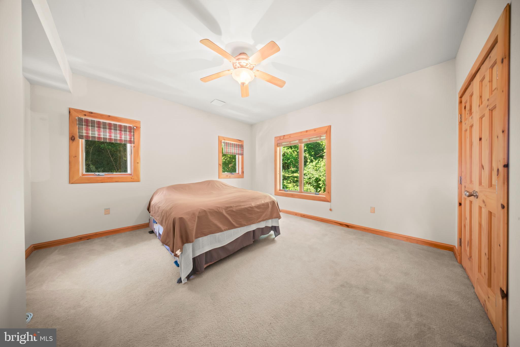 1473 North River Road Yardley, PA 19067 - Photo 32 of 42 a spacious bedroom with a bed and a window