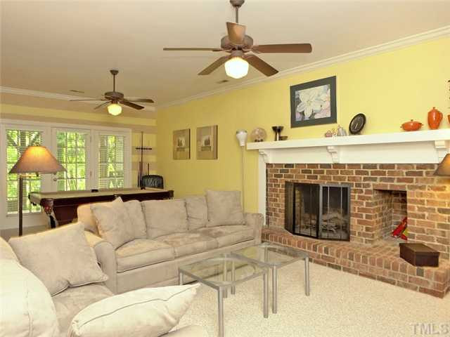 2520 Beechridge Road Raleigh, NC 27608 - Photo 16 of 25 Lower level family room has a wood burning fireplace. Den/Family/Great Room