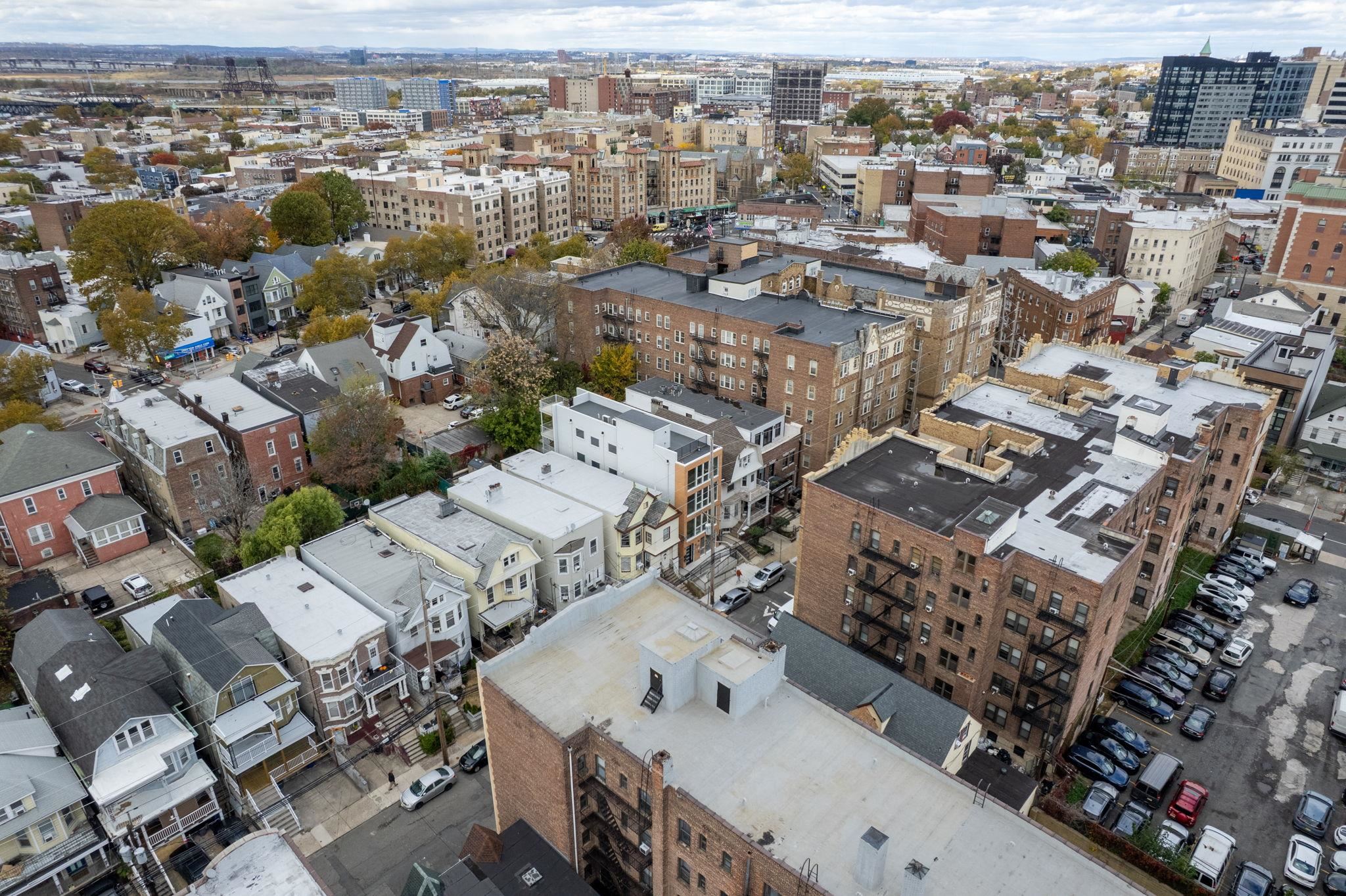77 Van Reypen Street, Unit 3 Jersey City, NJ 07306 - Photo 19 of 23 an aerial view of a city with lots of residential buildings
