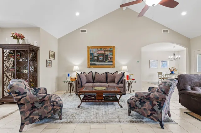 a living room with furniture and a couch