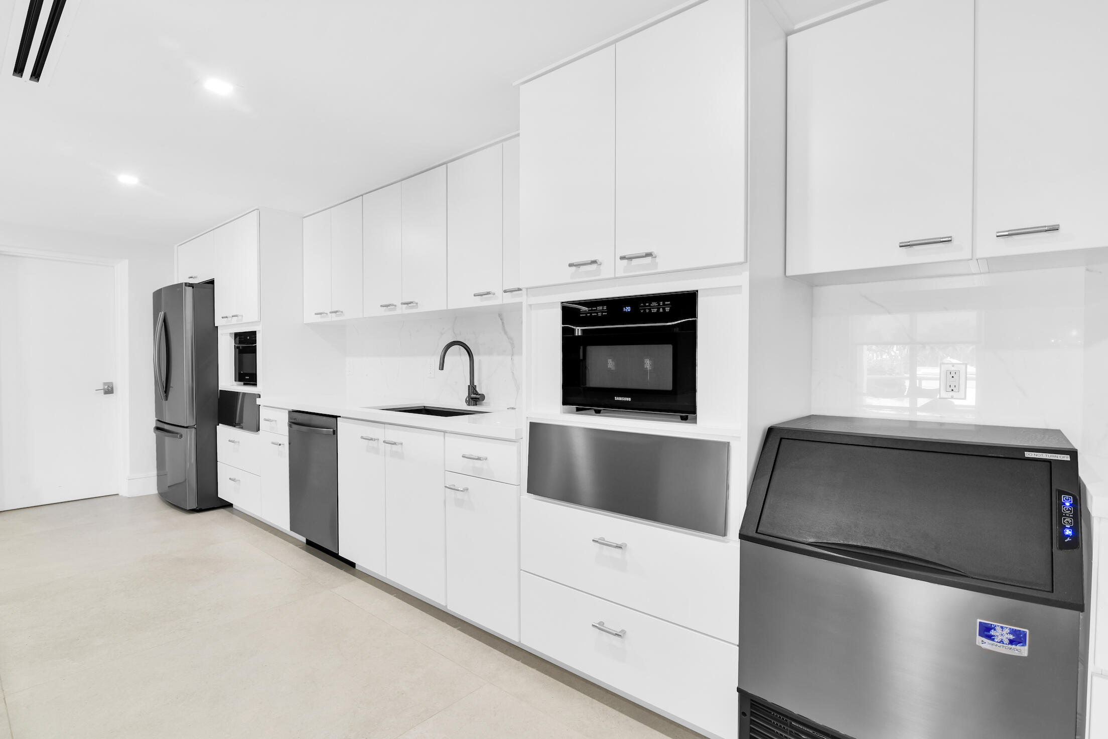 50 E Road, Unit 11D Delray Beach, FL 33483 - Photo 61 of 74 Community Room Kitchen