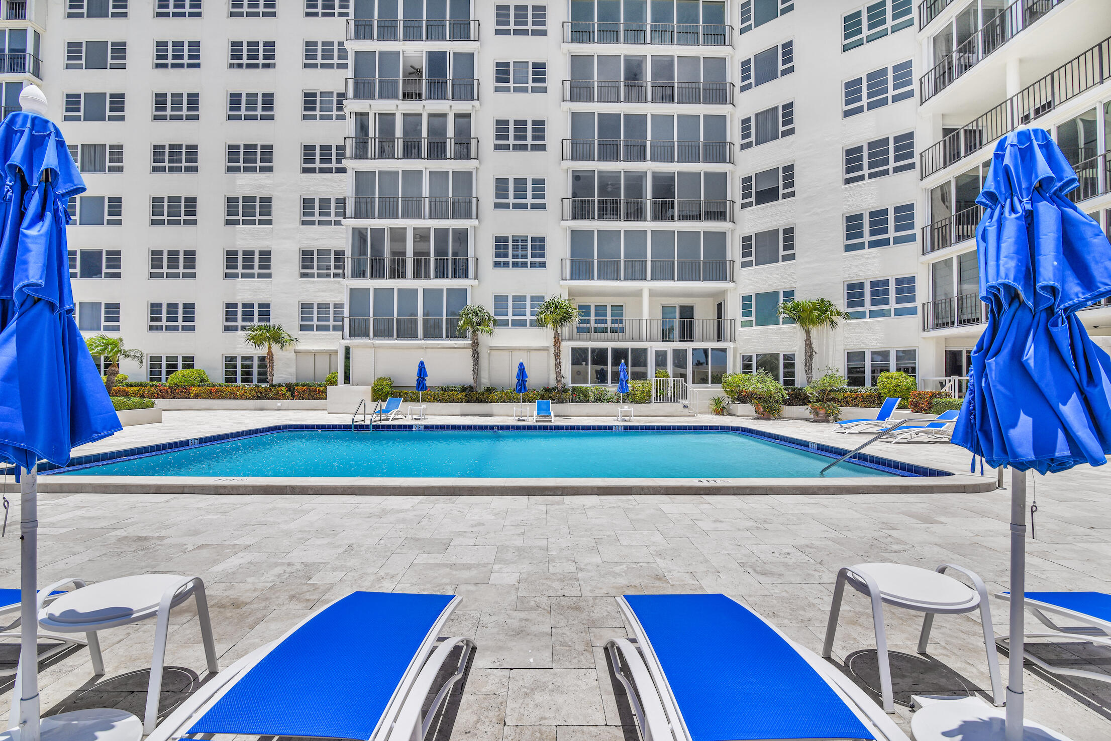50 E Road, Unit 11D Delray Beach, FL 33483 - Photo 64 of 74 Lounge Chairs and Umbrellas