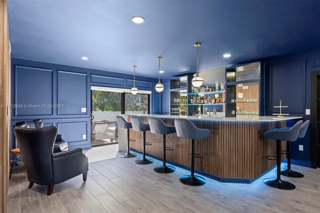 a room with furniture and a wooden floor