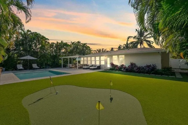 a view of a lake with a swimming pool