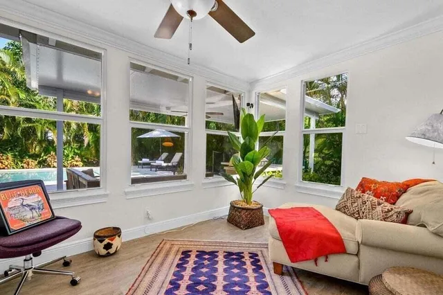 a living room with furniture and a window