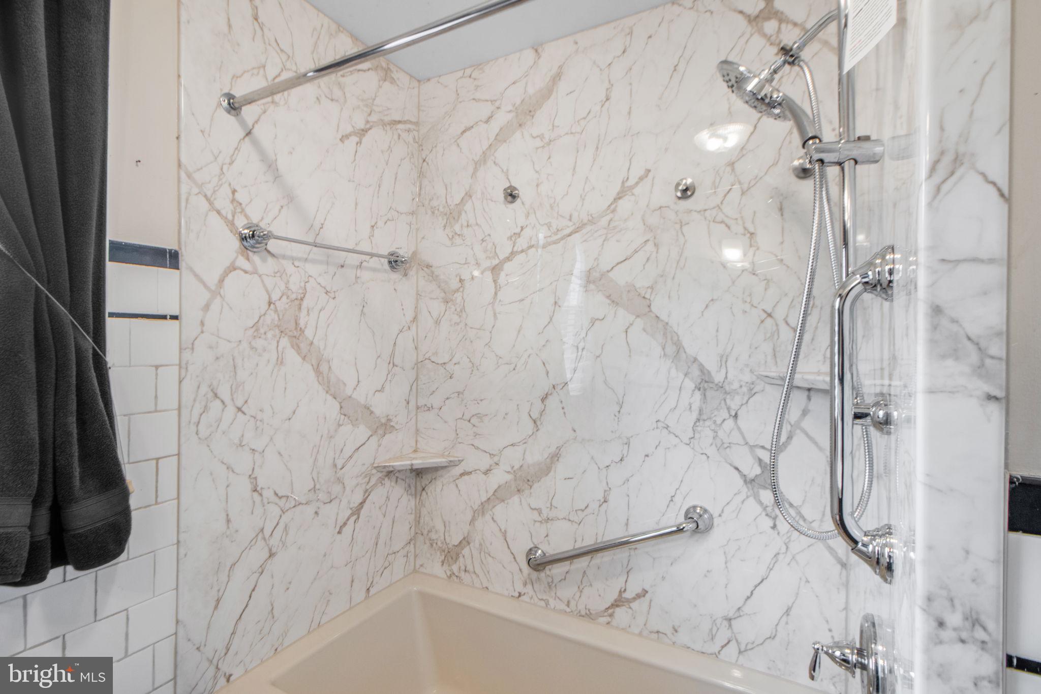 1903 Heathfield Road Baltimore, MD 21239 - Photo 21 of 30 a bathroom with a shower