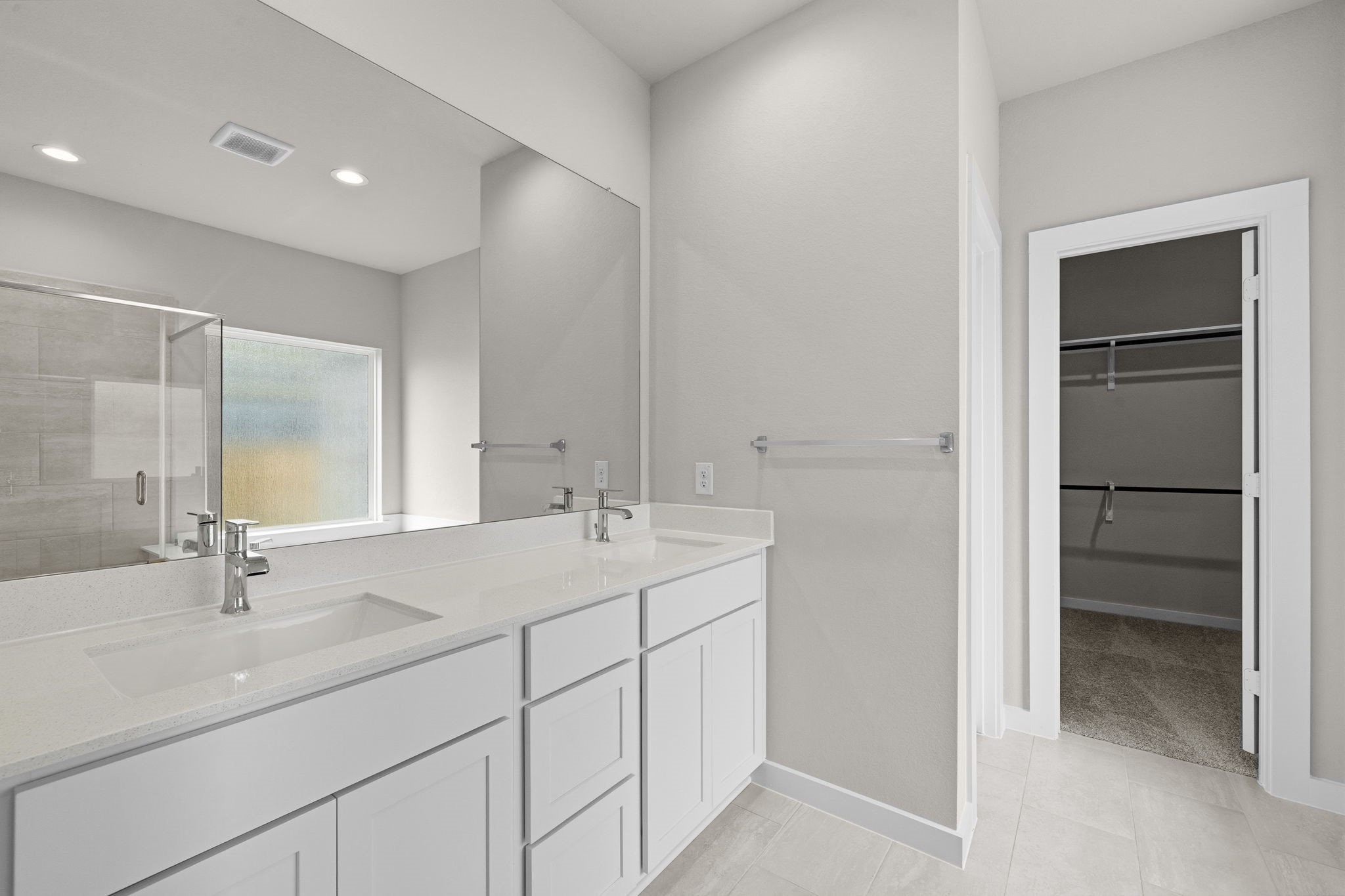 4017 Sun Burst Lane Brookshire, TX 77423 - Photo 15 of 49 a bathroom with a sink double vanity and a mirror