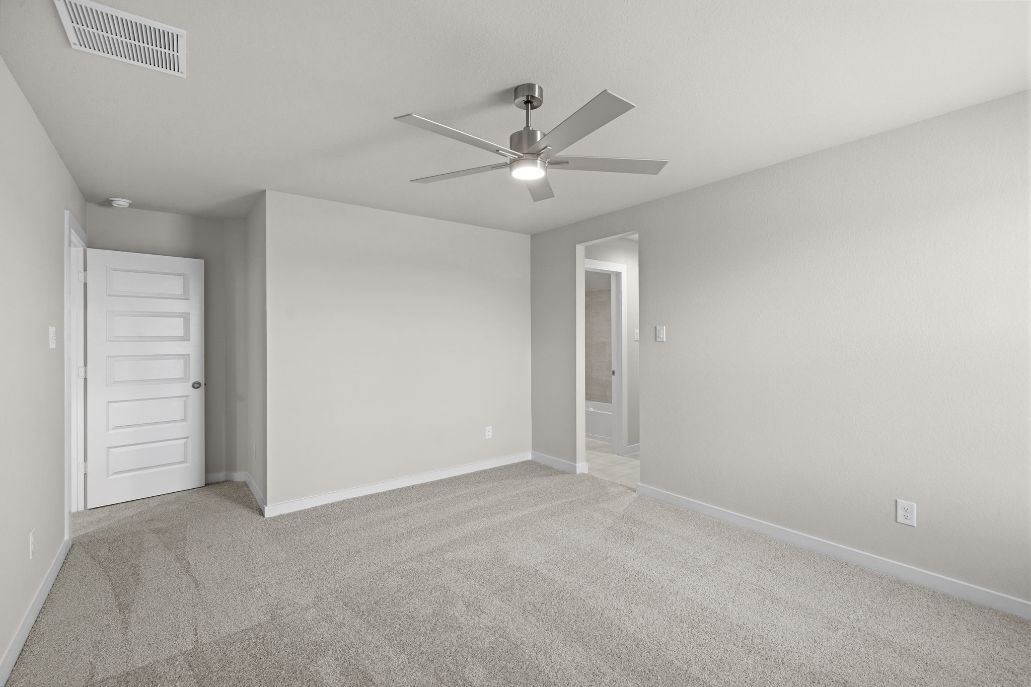 4017 Sun Burst Lane Brookshire, TX 77423 - Photo 24 of 49 an empty room with closet and fan