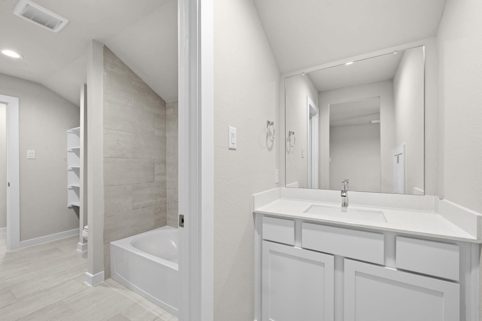 4017 Sun Burst Lane Brookshire, TX 77423 - Photo 25 of 49 a bathroom with a tub sink and mirror