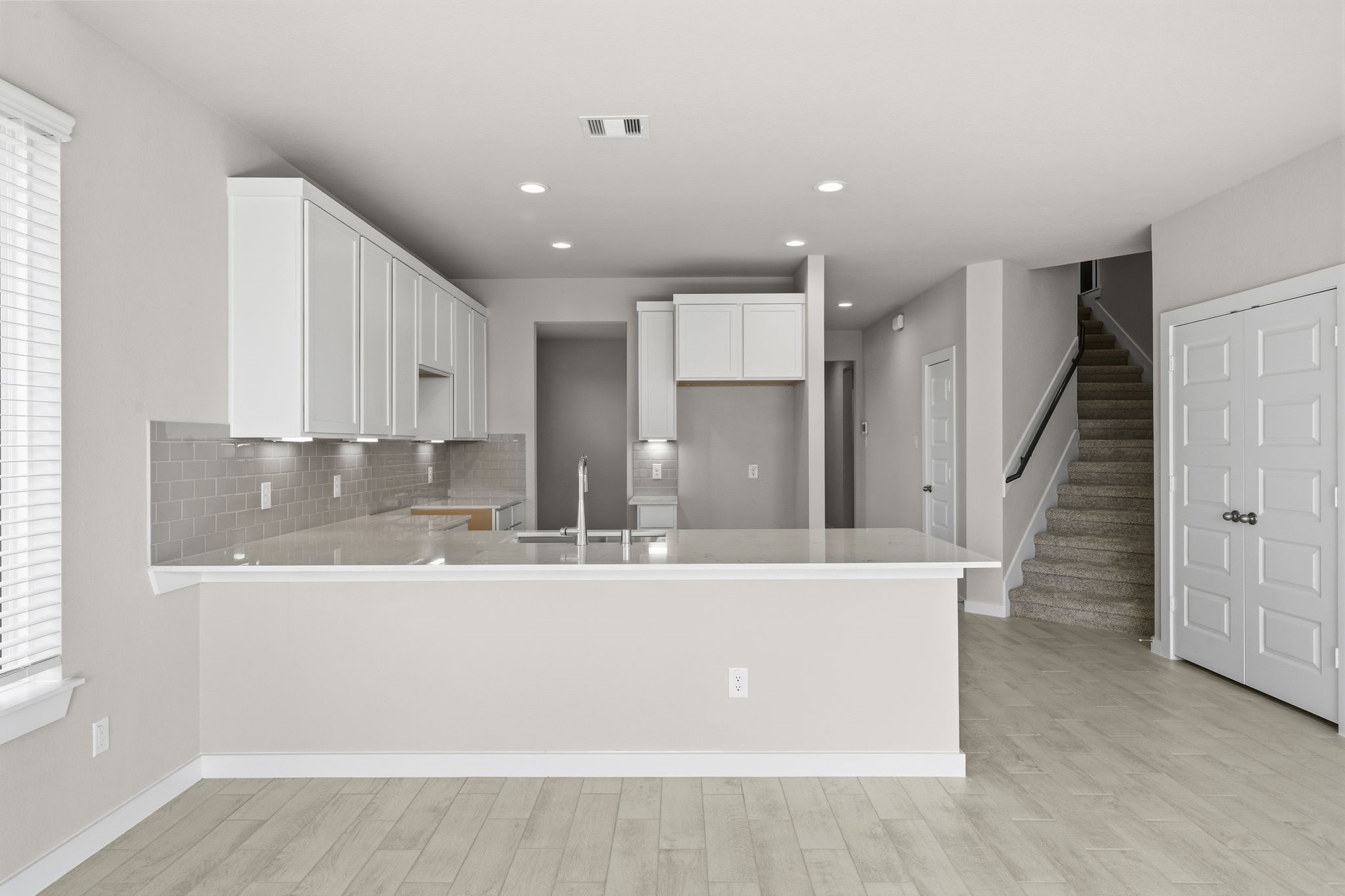 4017 Sun Burst Lane Brookshire, TX 77423 - Photo 3 of 49 a view of a kitchen with wooden floor and electronic appliances
