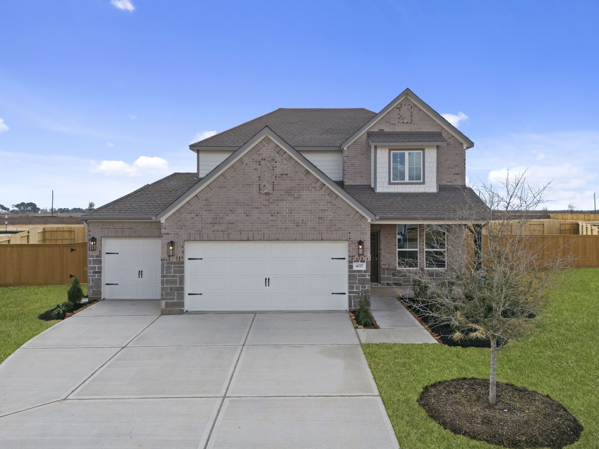 4017 Sun Burst Lane Brookshire, TX 77423 - Photo 32 of 49 a view of a house with a yard