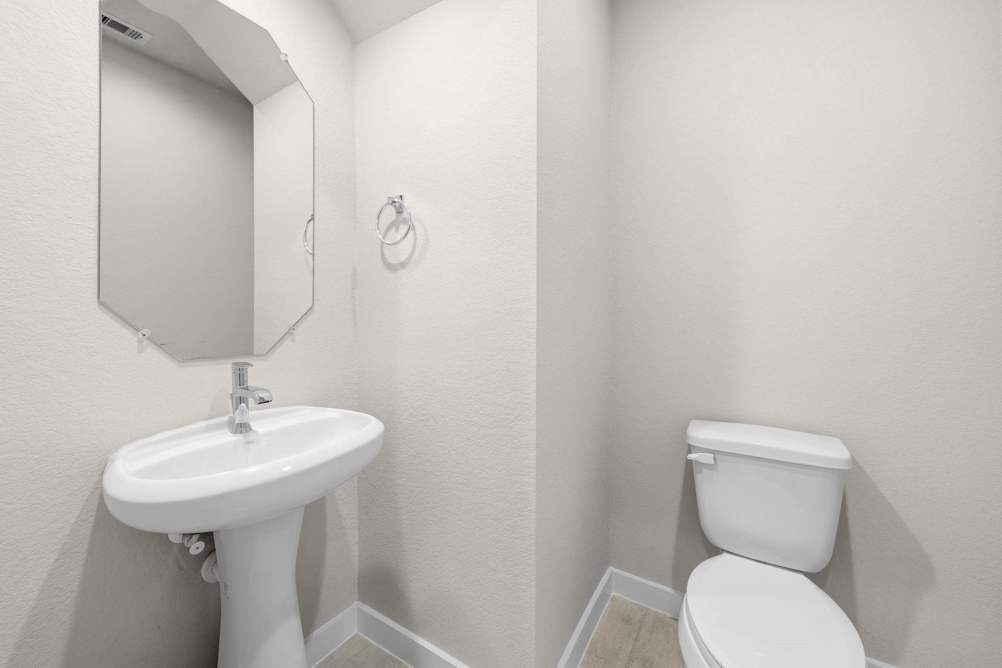 4017 Sun Burst Lane Brookshire, TX 77423 - Photo 5 of 49 a bathroom with a toilet sink and mirror