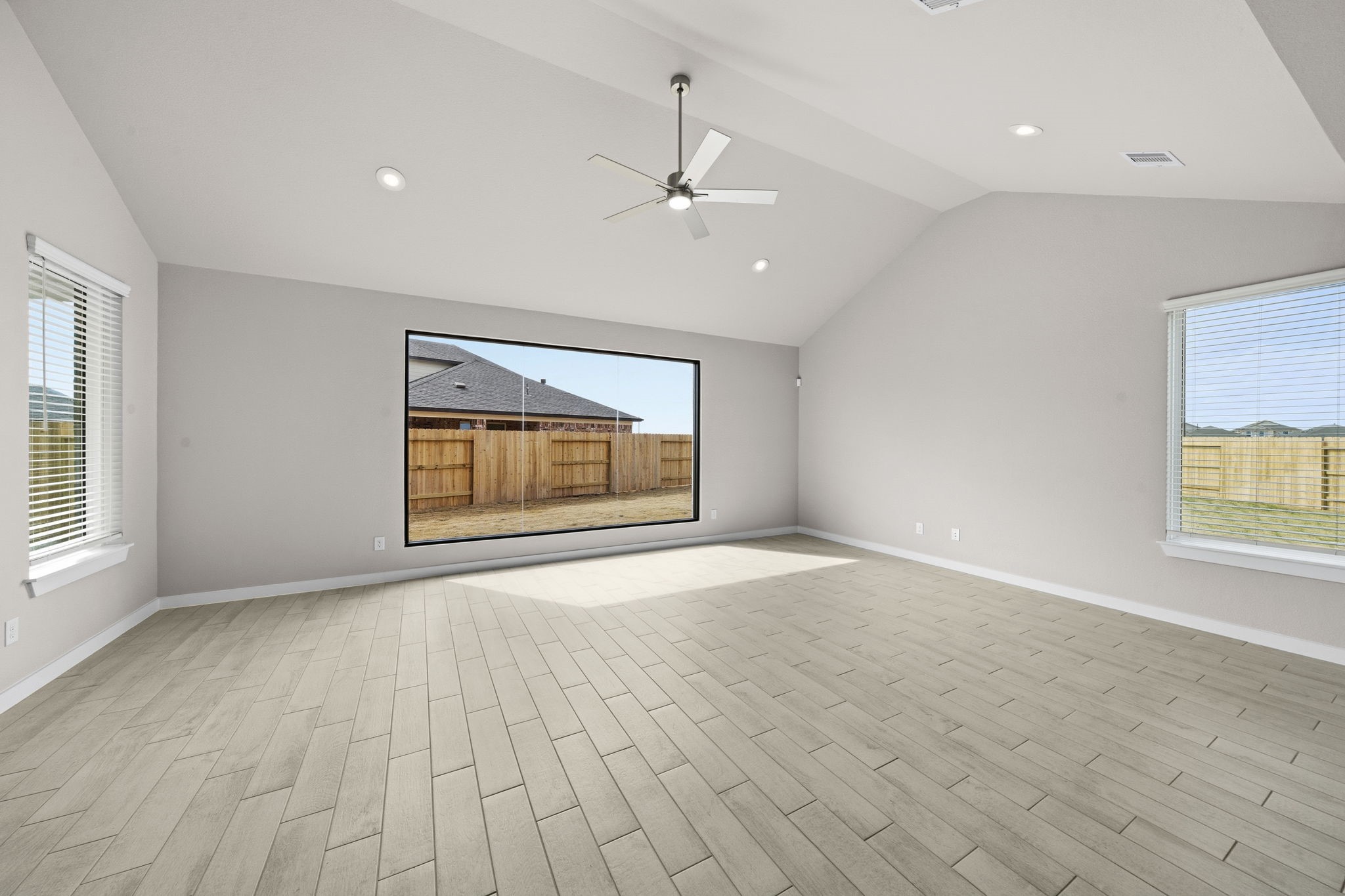 4017 Sun Burst Lane Brookshire, TX 77423 - Photo 8 of 49 an empty room with windows and cabinet