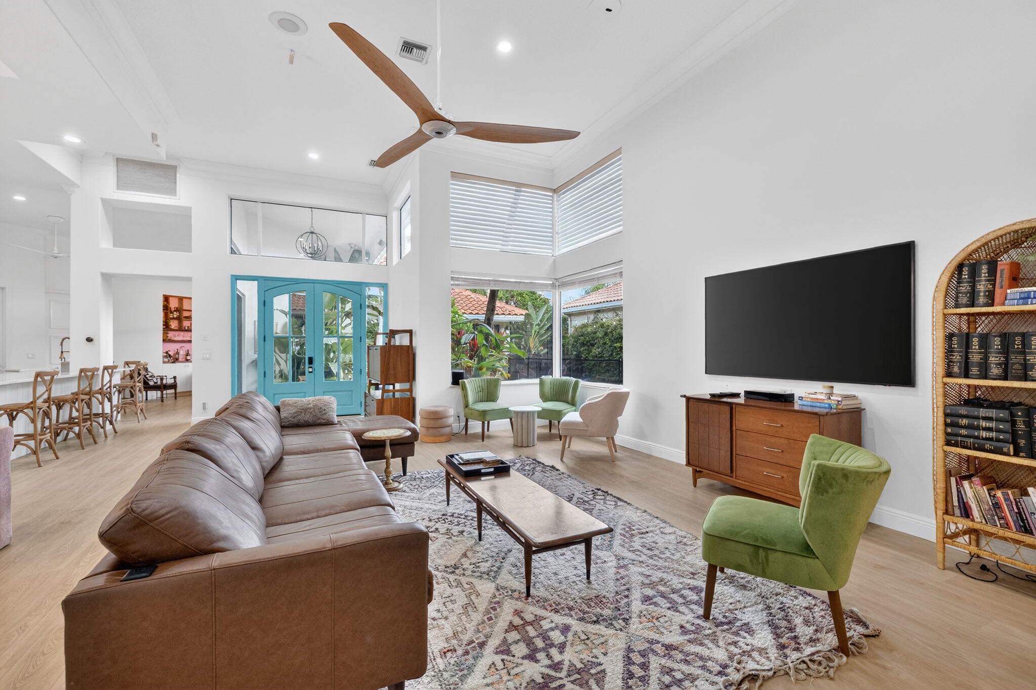 7450 Campo Florido Boca Raton, FL 33433 - Photo 1 of 63 a living room with furniture and a flat screen tv