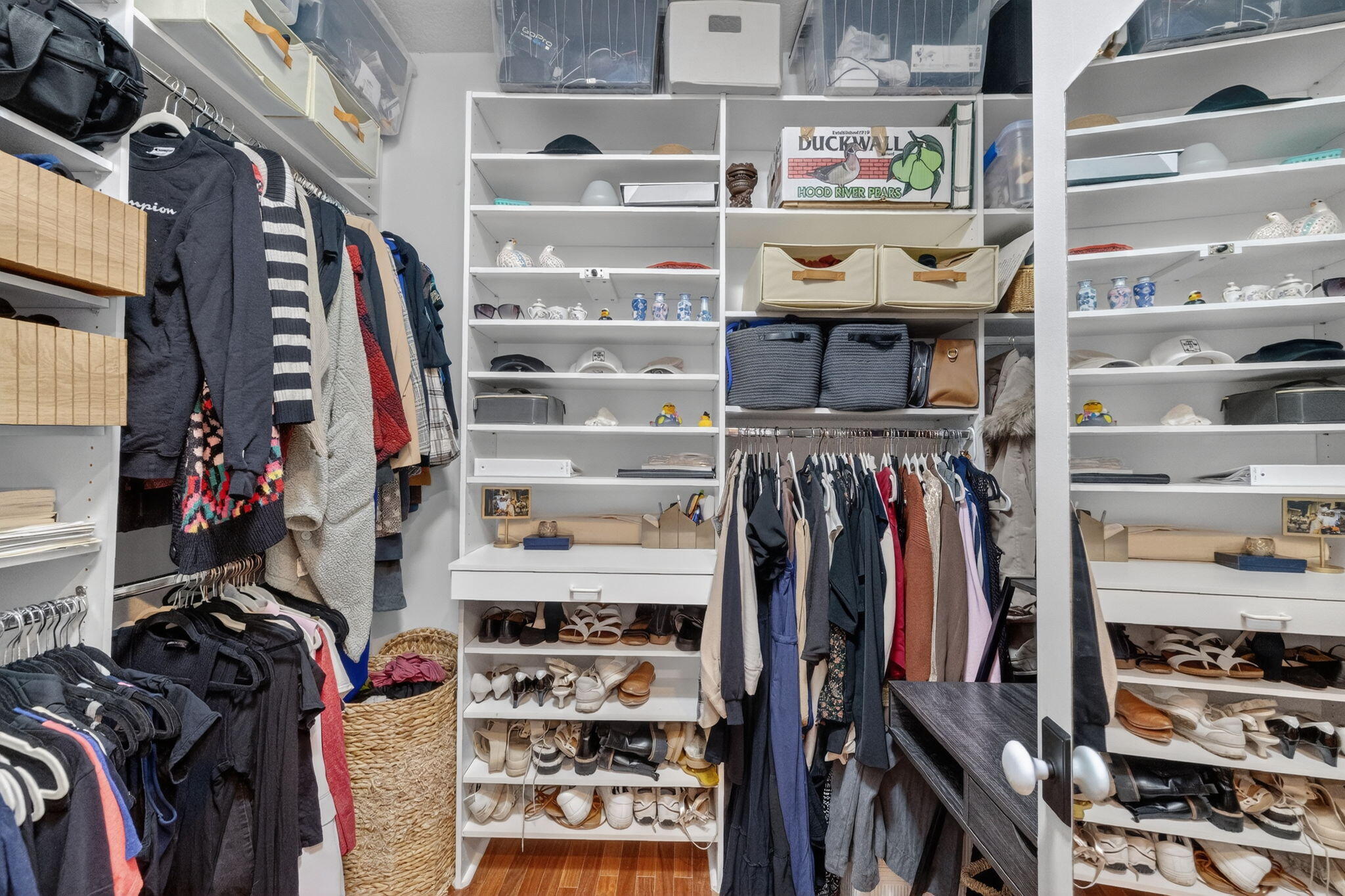 7450 Campo Florido Boca Raton, FL 33433 - Photo 28 of 63 a view of walk in closet with clothes and shoes