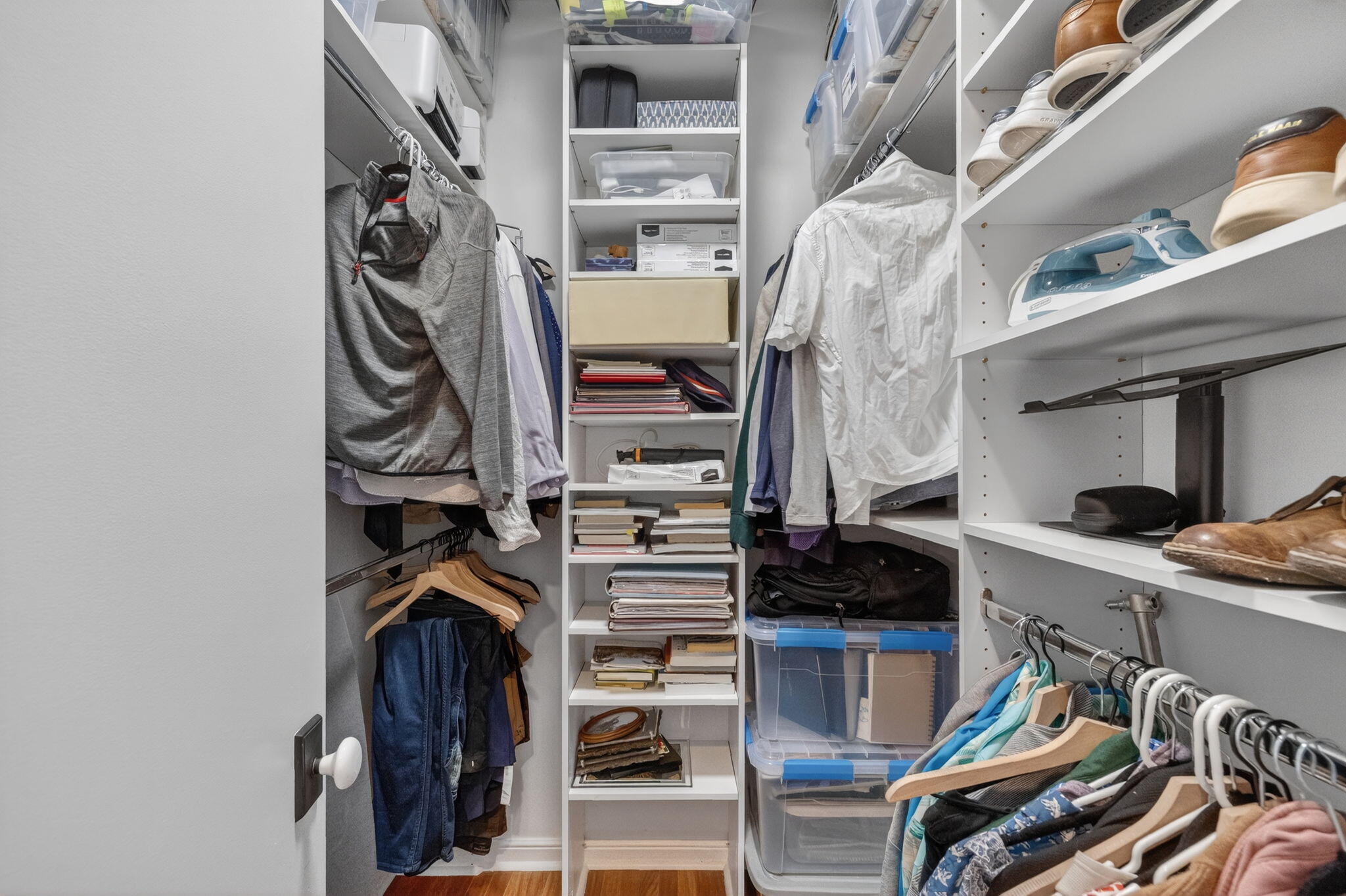 7450 Campo Florido Boca Raton, FL 33433 - Photo 29 of 63 a view of walk in closet with clothes and shoes