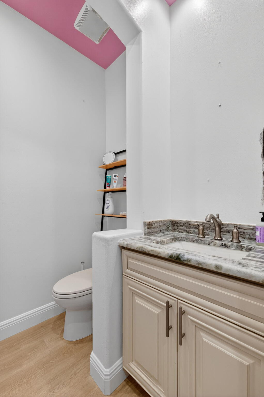 7450 Campo Florido Boca Raton, FL 33433 - Photo 35 of 63 a bathroom with a granite countertop sink a toilet and a mirror