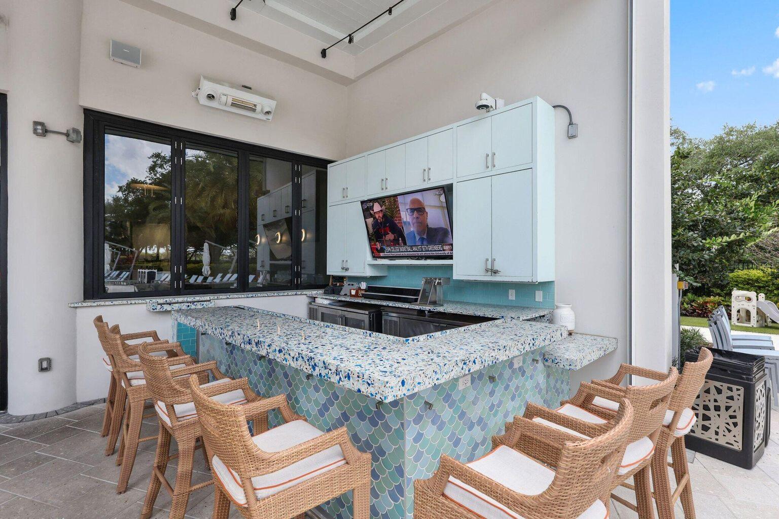 7450 Campo Florido Boca Raton, FL 33433 - Photo 59 of 63 a living room with furniture a flat screen tv and a large window