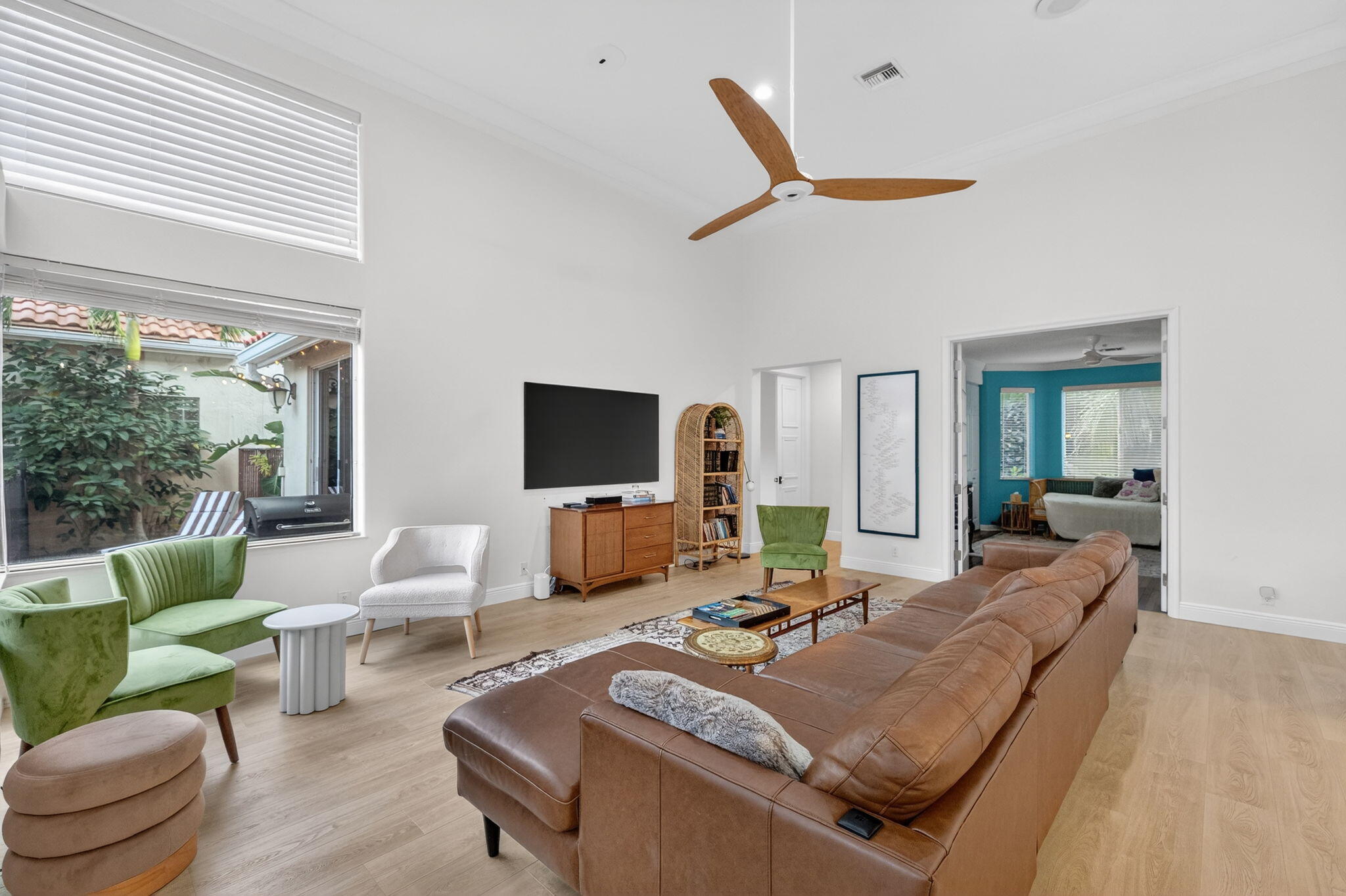 7450 Campo Florido Boca Raton, FL 33433 - Photo 10 of 63 a living room with furniture and a flat screen tv