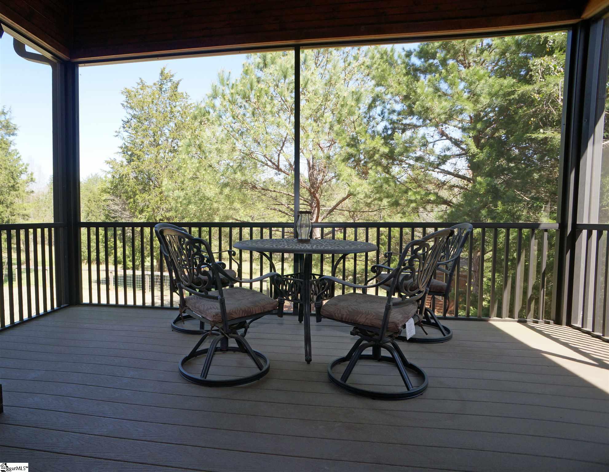 131 Croxton Road Williamston, SC 29697 - Photo 11 of 36 From the living room through the French doors to this spacious screened patio.