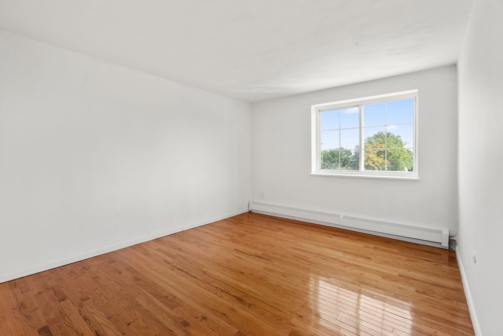 15 Staples Avenue, Unit 41 Everett, MA 02149 - Photo 8 of 9 an empty room with a window
