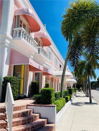 a view of a building with a yard