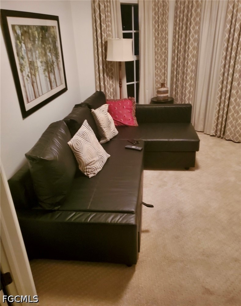 10072 Oakhurst Way Fort Myers, FL 33913 - Photo 12 of 26 a living room with furniture and a couch