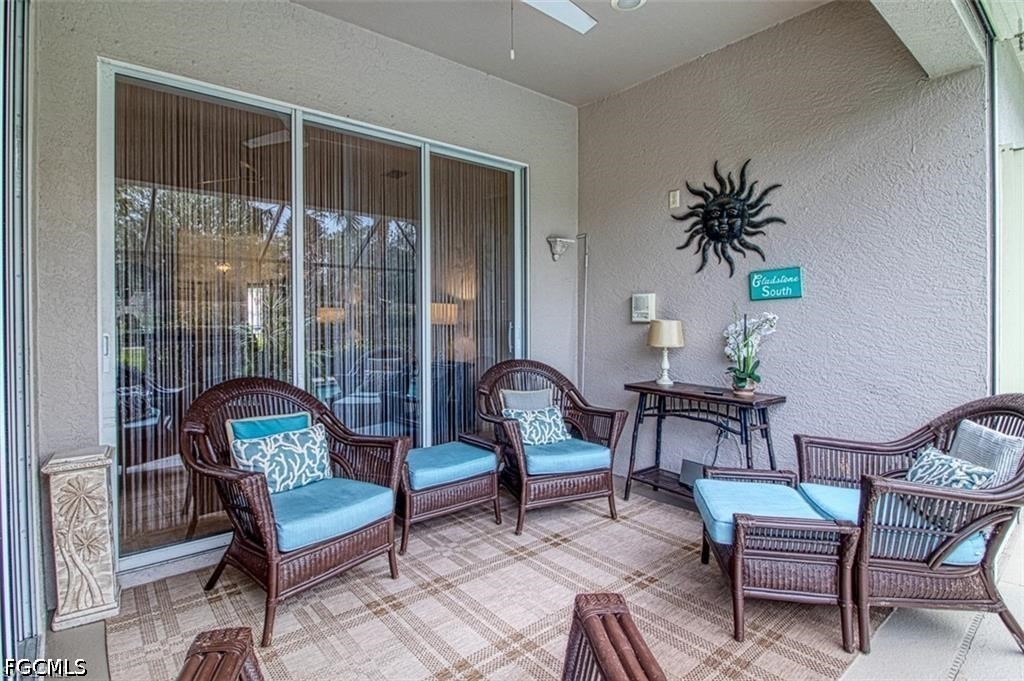 10072 Oakhurst Way Fort Myers, FL 33913 - Photo 20 of 26 a living room with furniture and a window