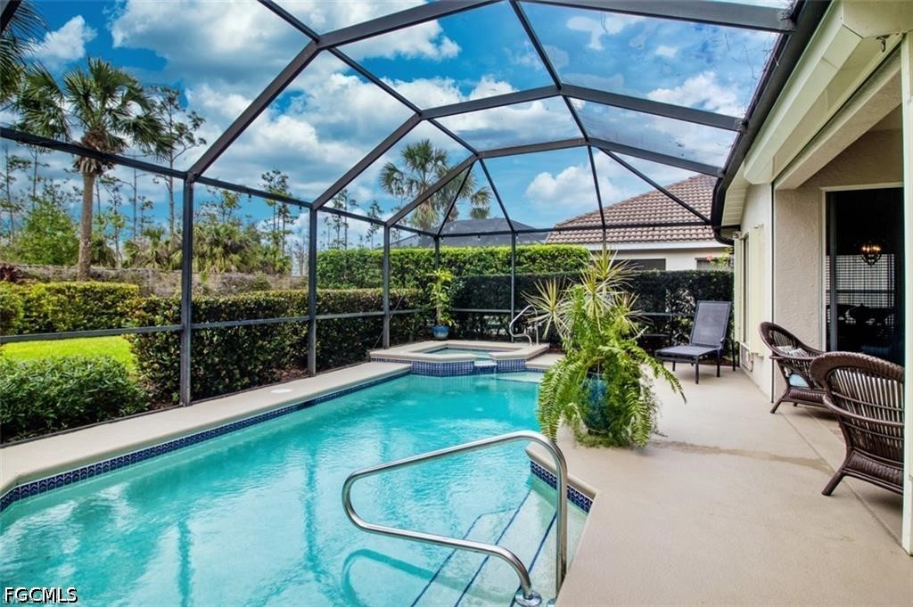 10072 Oakhurst Way Fort Myers, FL 33913 - Photo 21 of 26 a view of a chairs and table in a patio