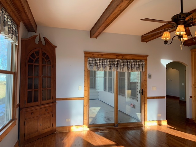 17885 Harter Road Maple Park, IL 60151 - Photo 8 of 16 a view of a hallway with wooden floor and staircase