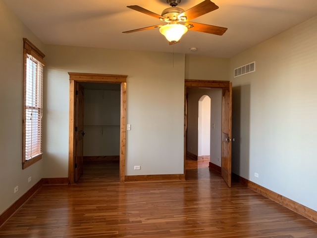 17885 Harter Road Maple Park, IL 60151 - Photo 9 of 16 a view of an empty room with wooden floor and a window