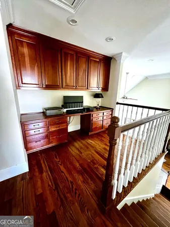 a bedroom with a bed and a table in it