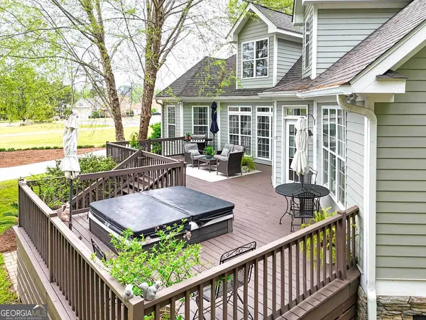 a view of an house with patio and wooden floor