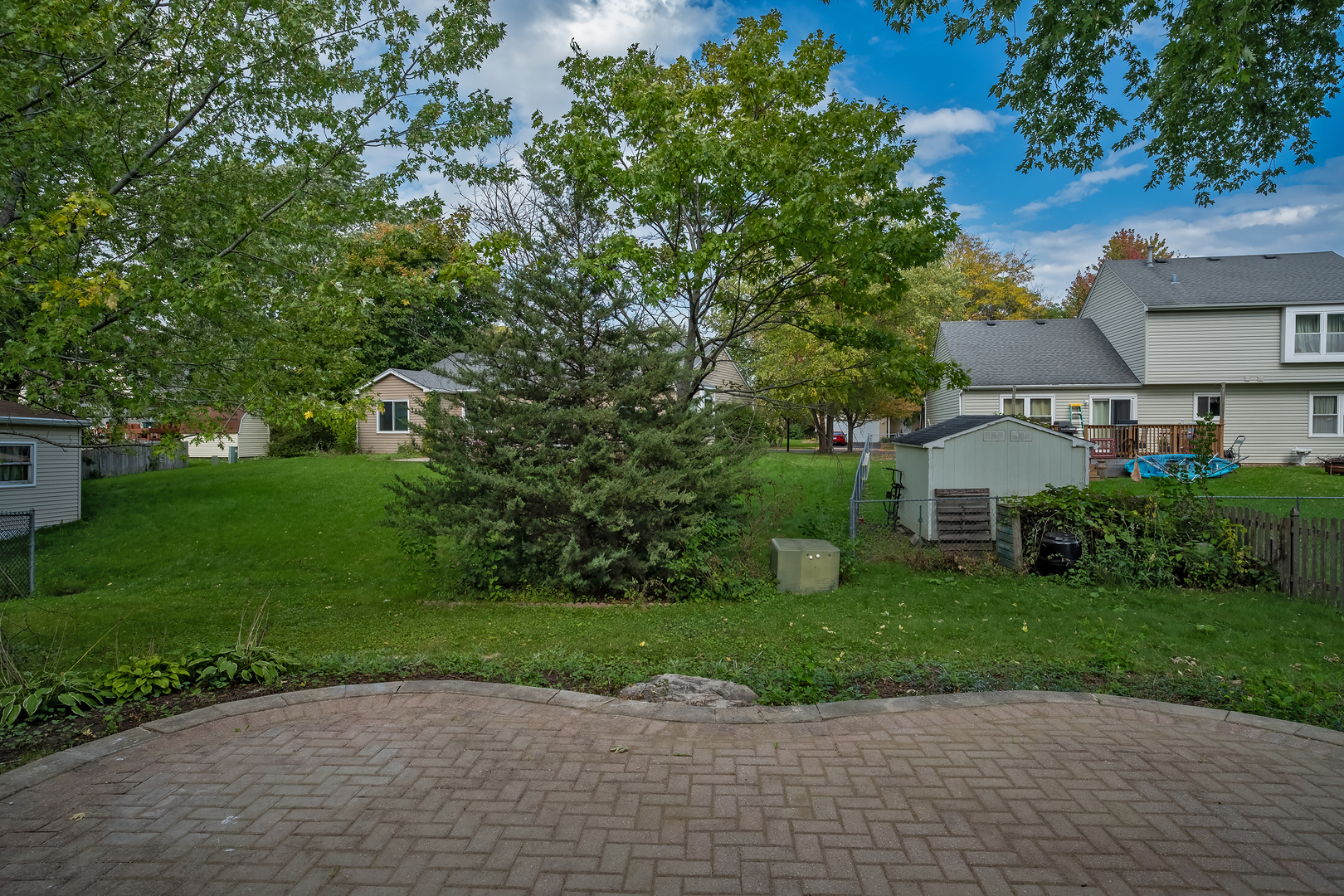 2860 Bridgeport Lane Aurora, IL 60504 - Photo 19 of 19 a view of a house with a yard