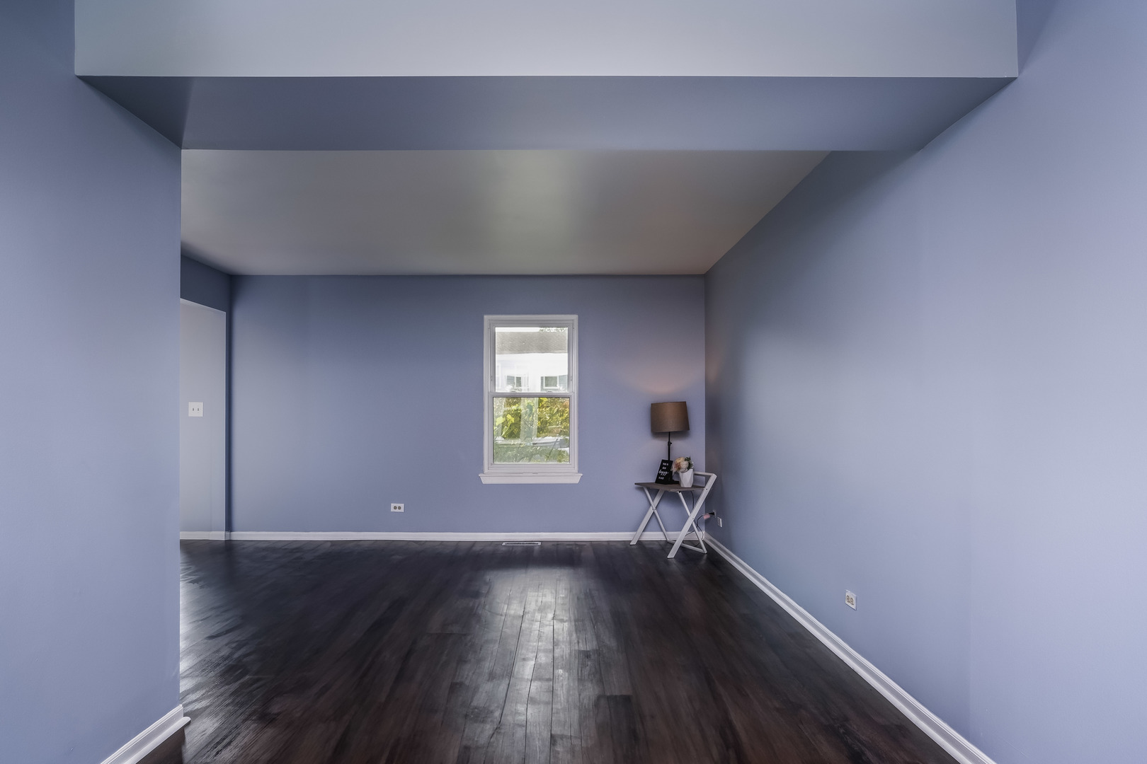 2860 Bridgeport Lane Aurora, IL 60504 - Photo 2 of 19 an empty room with wooden floor and windows