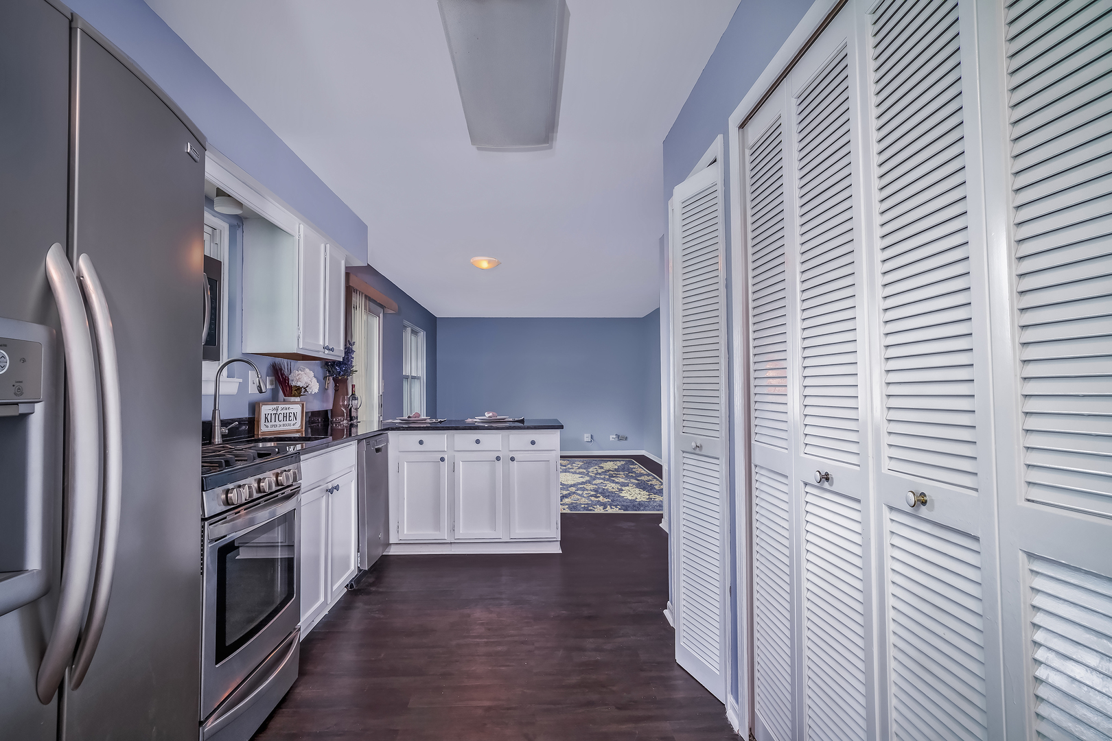 2860 Bridgeport Lane Aurora, IL 60504 - Photo 6 of 19 a kitchen with stainless steel appliances granite countertop a refrigerator and a stove