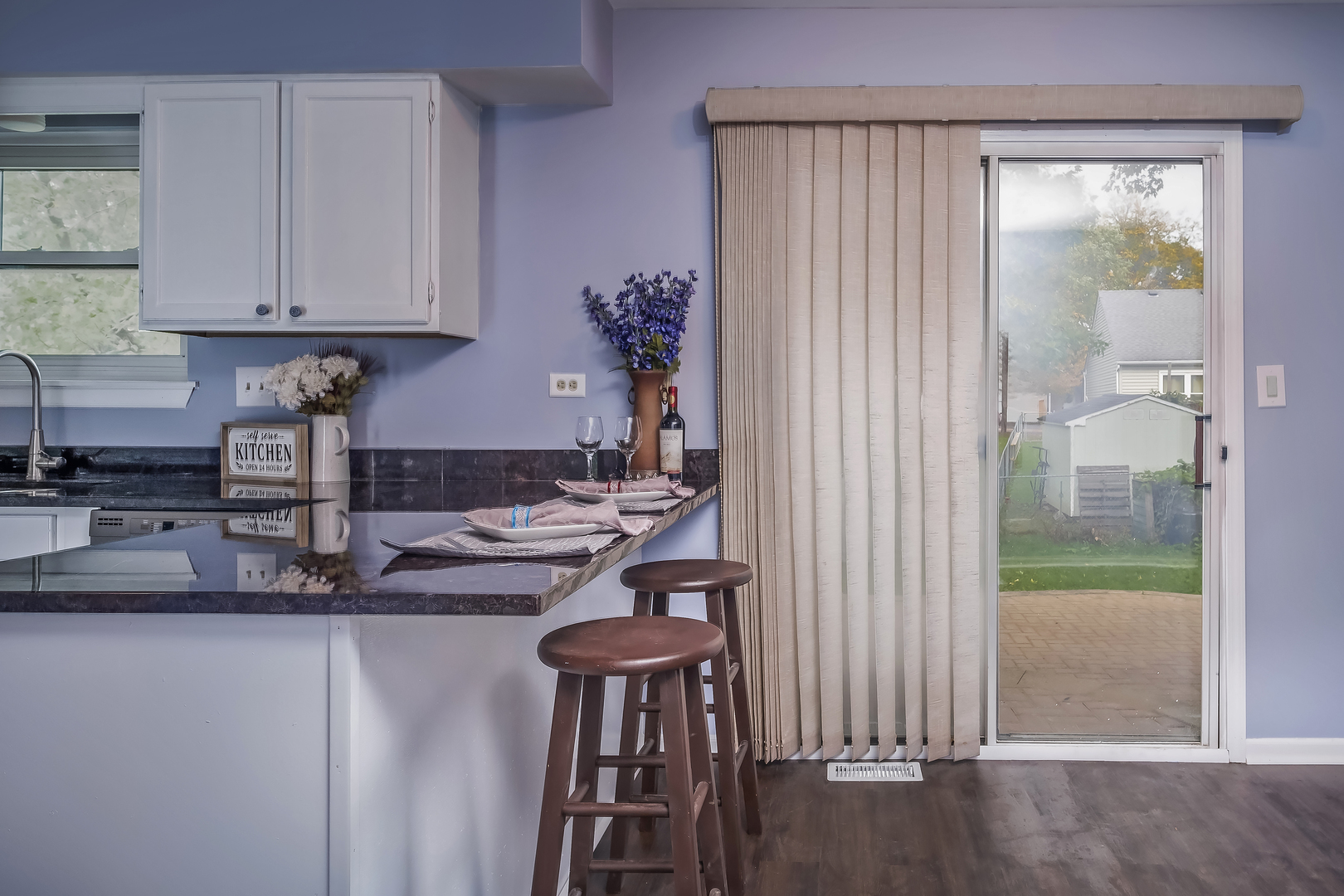 2860 Bridgeport Lane Aurora, IL 60504 - Photo 7 of 19 a kitchen with stainless steel appliances granite countertop a refrigerator and a sink