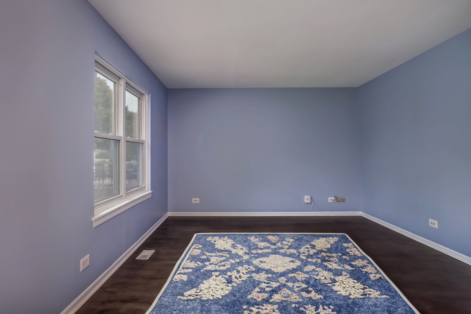 2860 Bridgeport Lane Aurora, IL 60504 - Photo 8 of 19 an empty room with wooden floor and a window