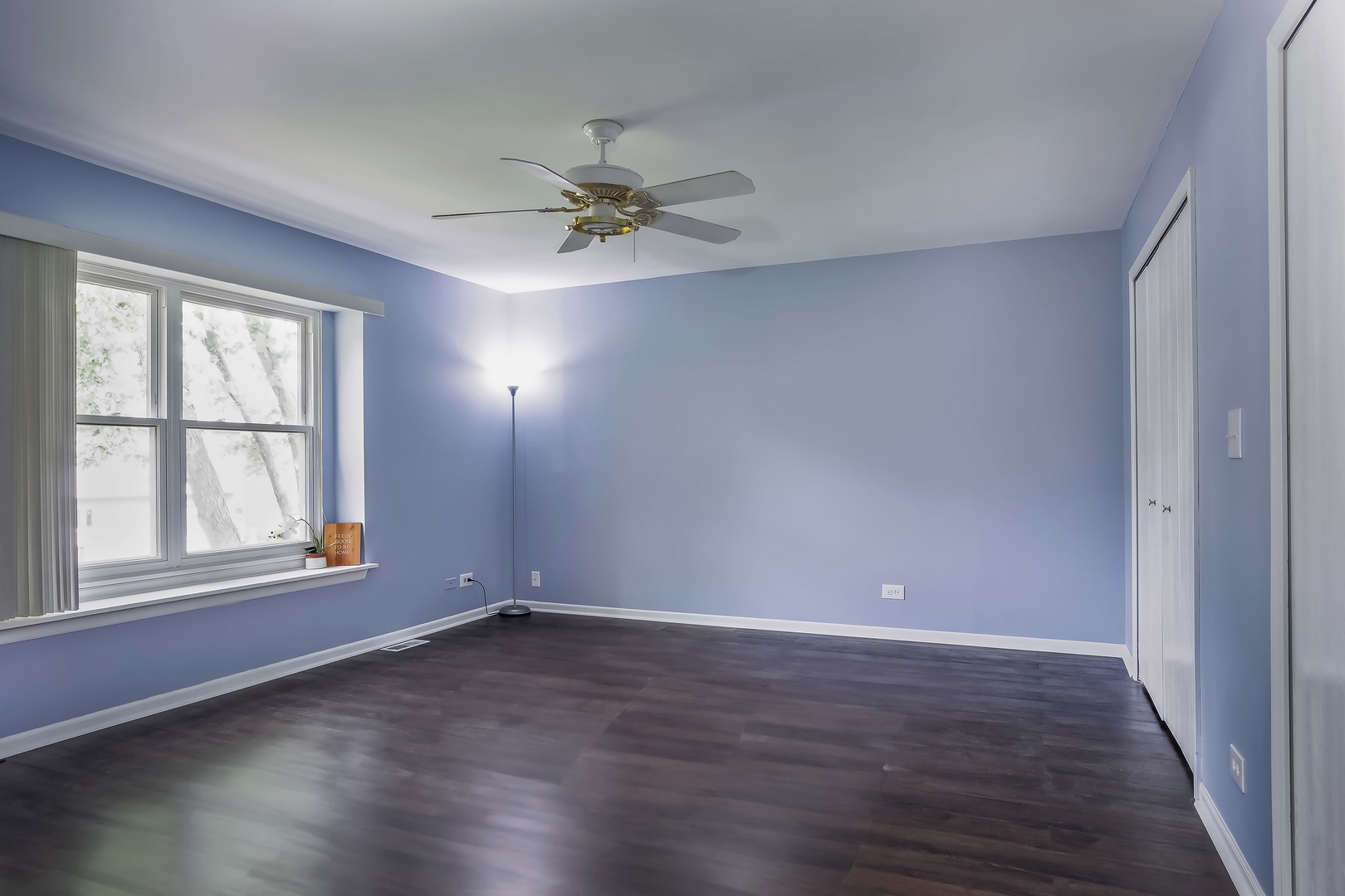 2860 Bridgeport Lane Aurora, IL 60504 - Photo 10 of 19 wooden floor in an empty room with a window
