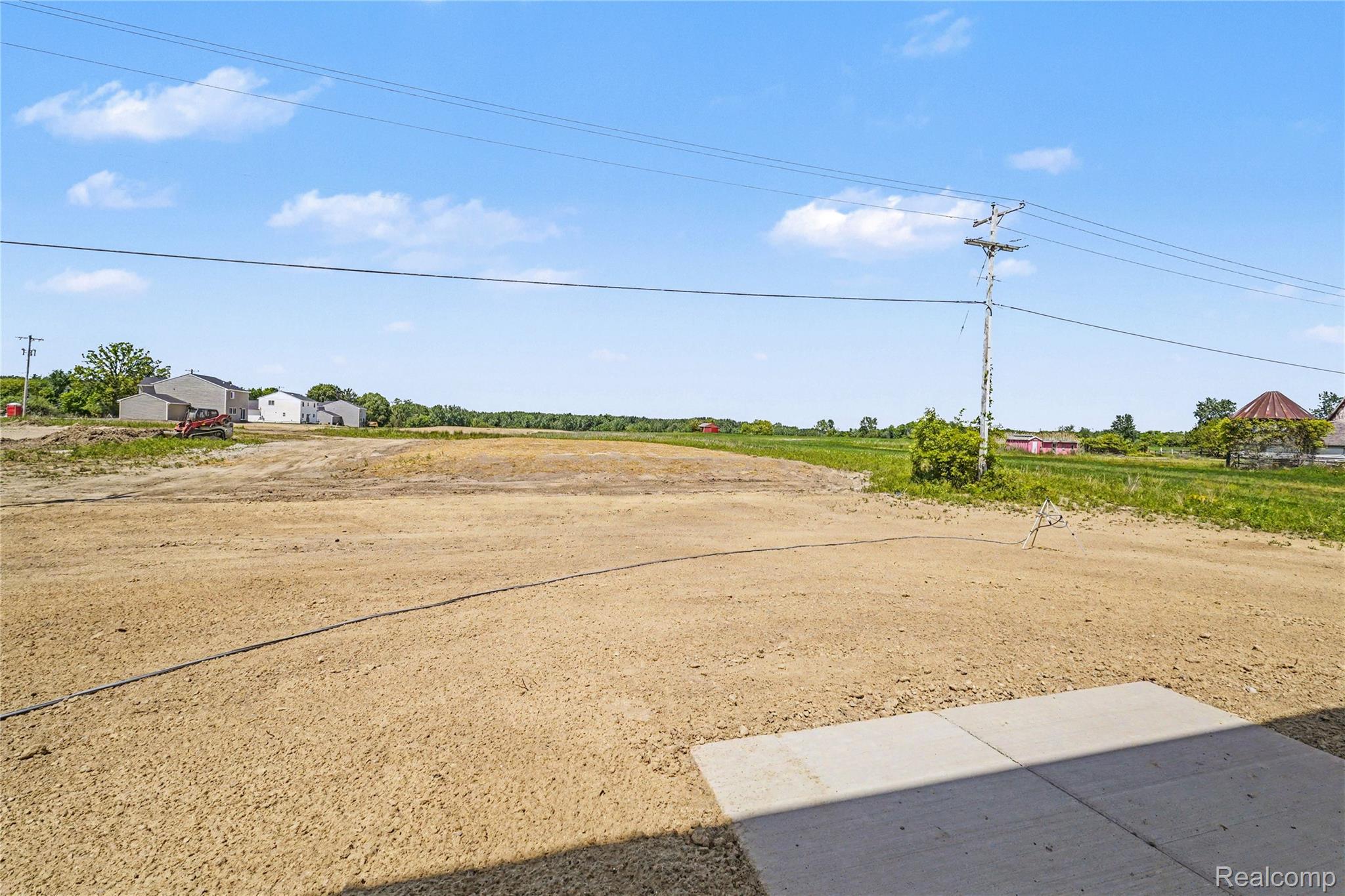 6030 Lahring Road Linden, MI 48451 - Photo 23 of 36 Home has a 10x10 patio for backyard enjoyment and outdoor dining & entertaining